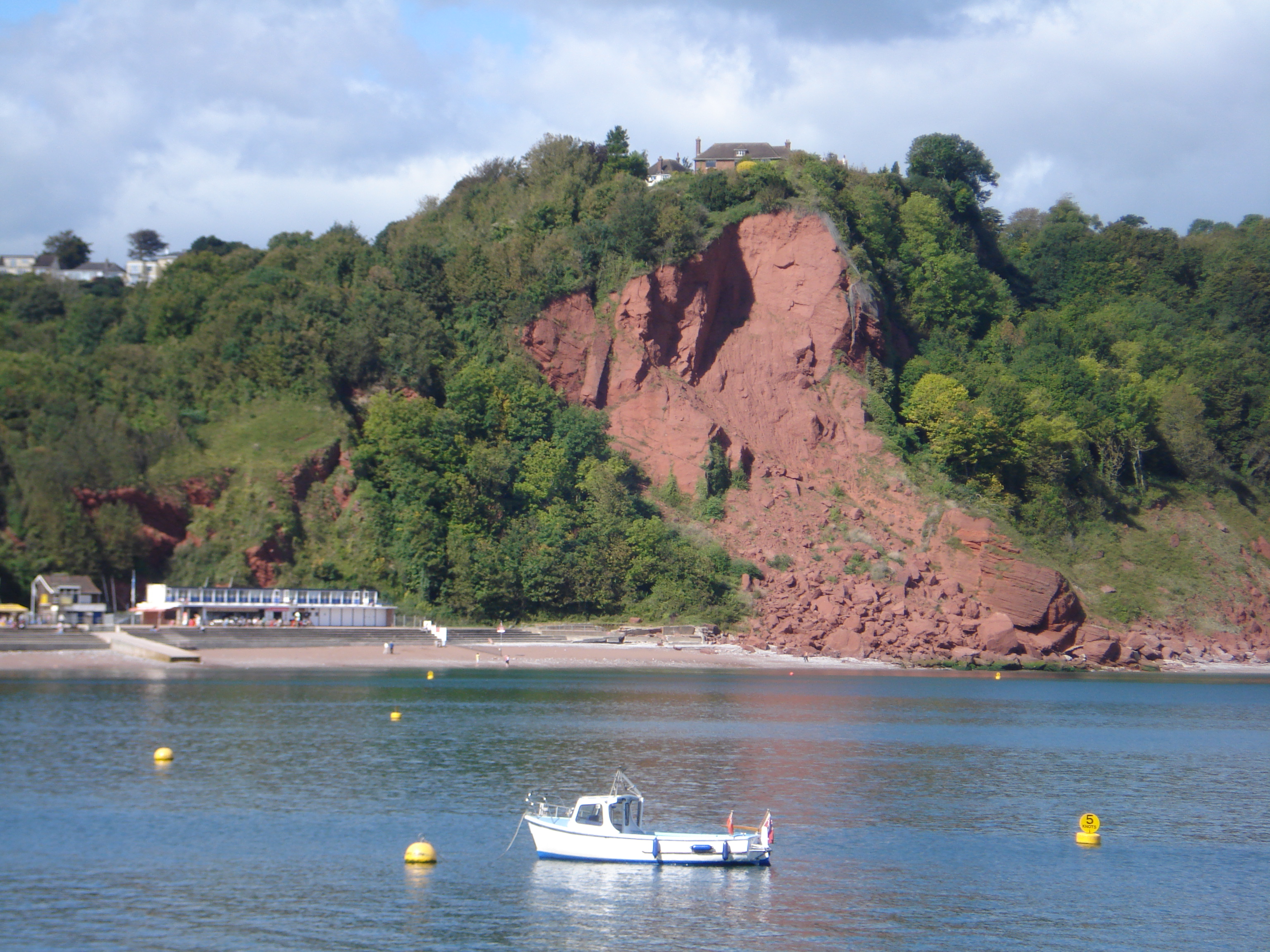 The house clinging on above the landslip © Pat Wilson